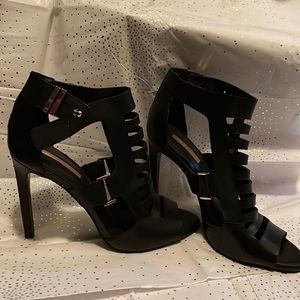 Never worn BCBG BLACK WITH GOLD BUCKLE